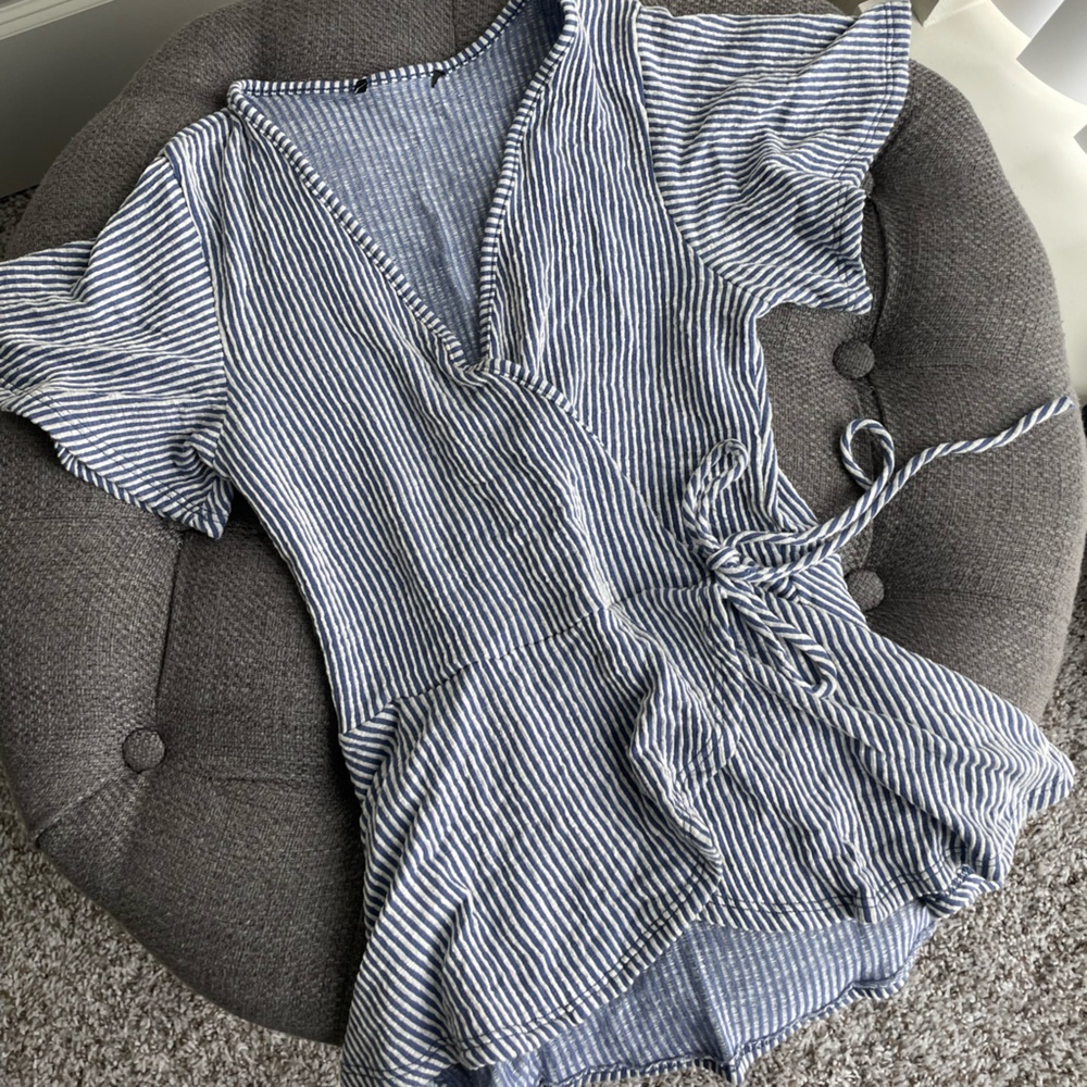 Not sure on brand, size small, purple-blue stripes with white stripes.